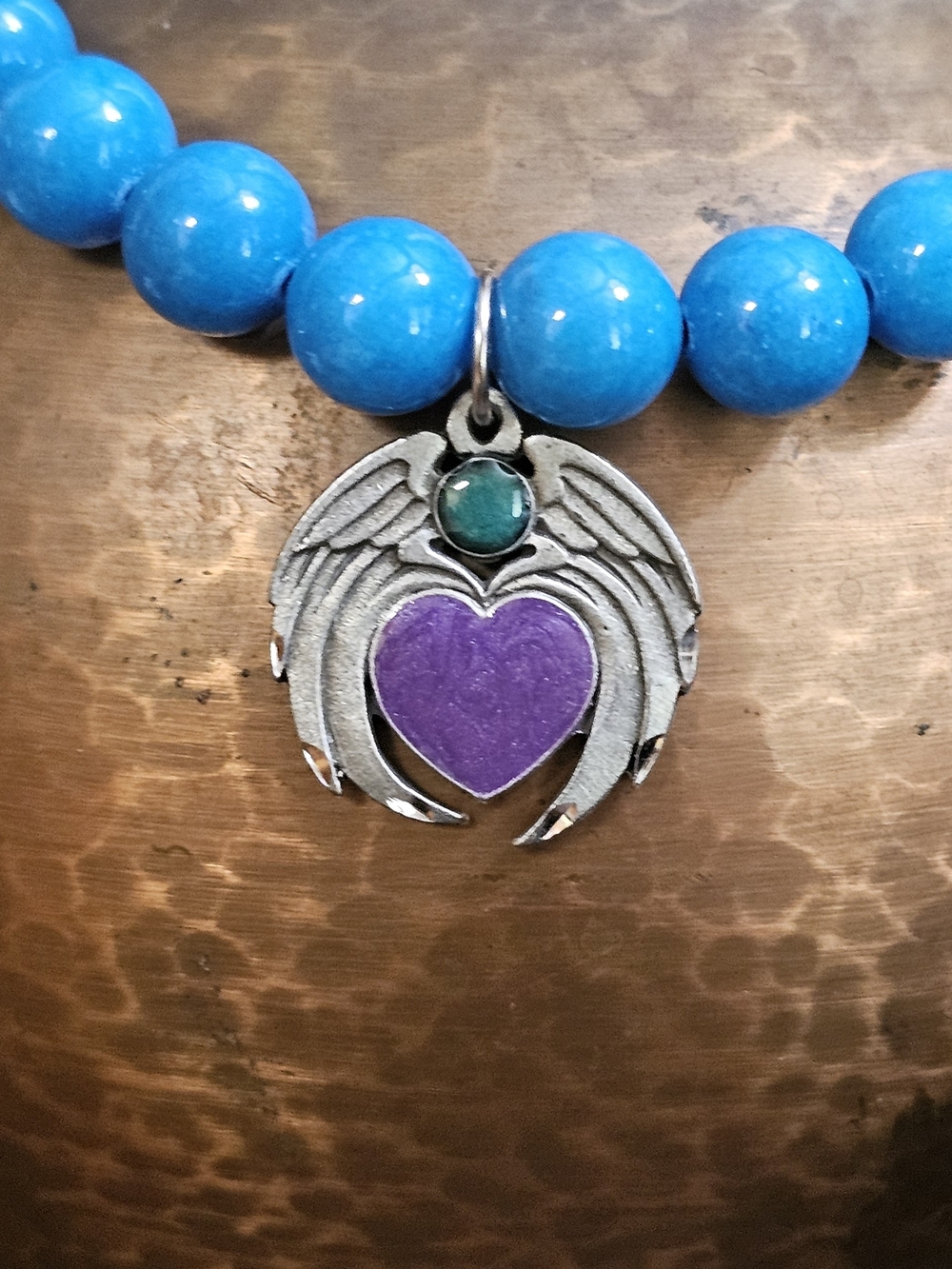 Blue 10mm Beaded Necklace with Purple Heart Wing Pendant, 16"